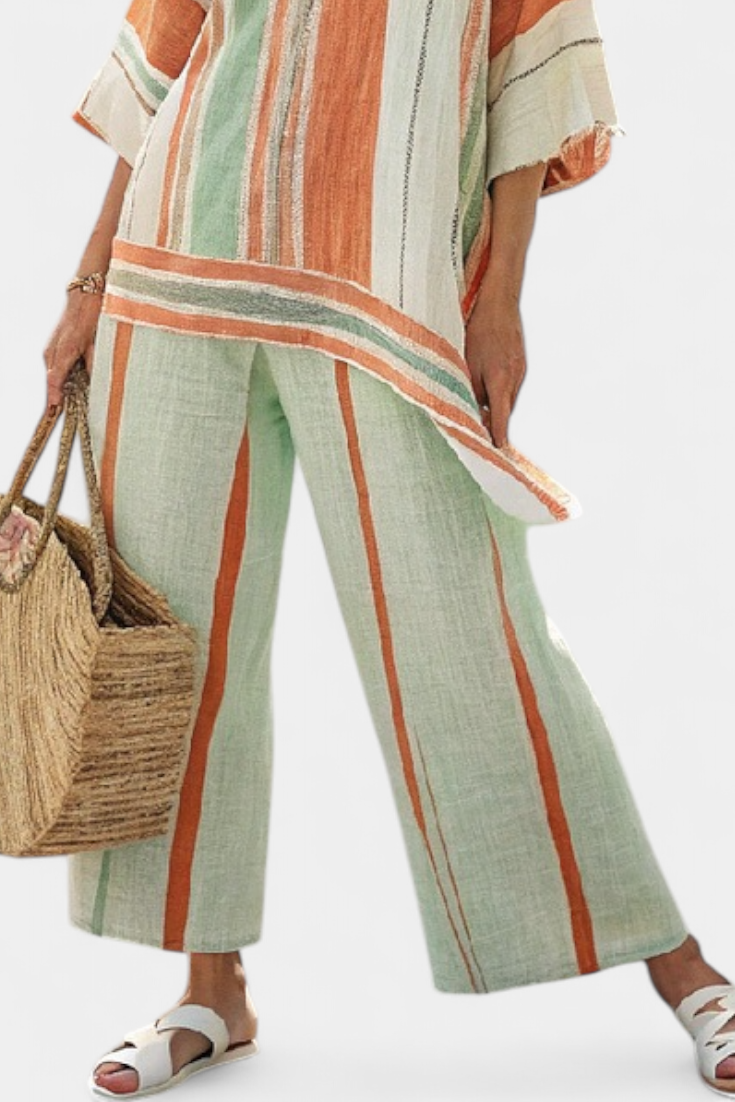 Elisabetta – top asimmetrico elegante e pantaloni a gamba larga