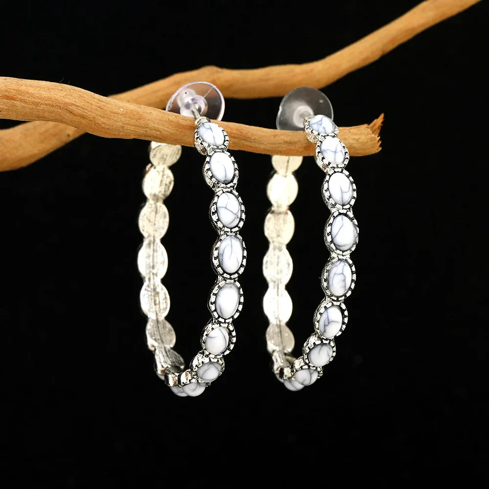 Orecchini a cerchio ovali vintage in argento