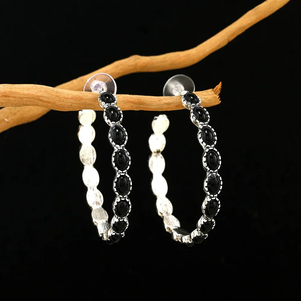 Orecchini a cerchio ovali vintage in argento